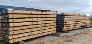 Stacked eucalyptus timber mats demonstrating cost-effective strength for ground protection applications