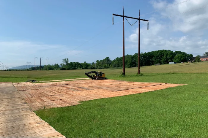 Transmission line right-of-way Eucalyptus mats protecting sensitive agricultural land
